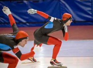 a speed skater pulls ahead, to get things done
